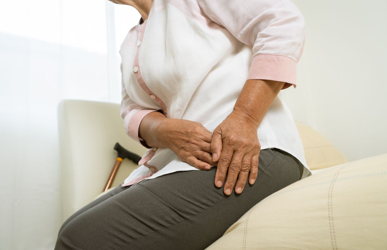 Woman experiencing hip discomfort