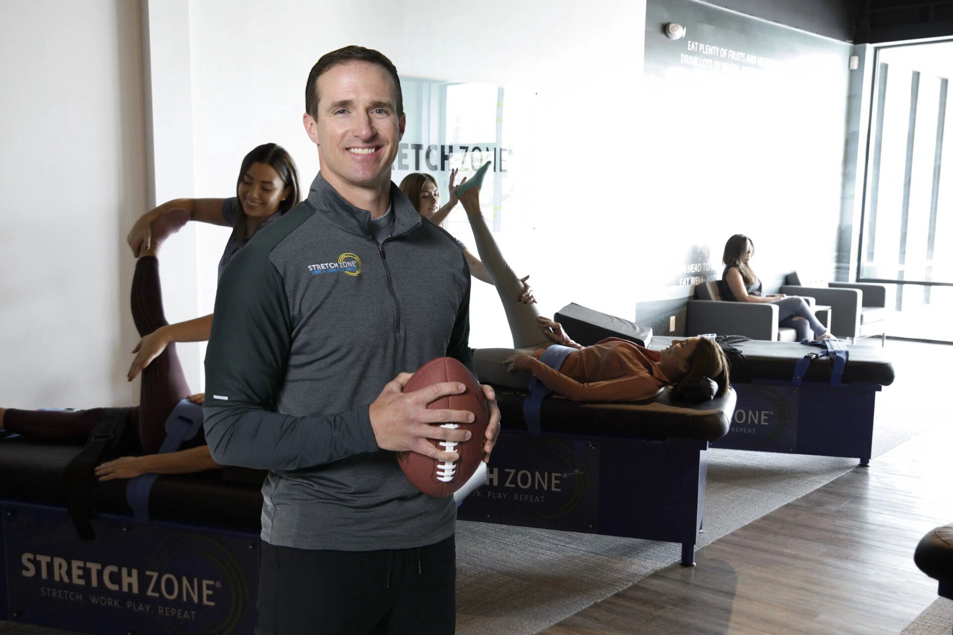 Drew Brees holding football