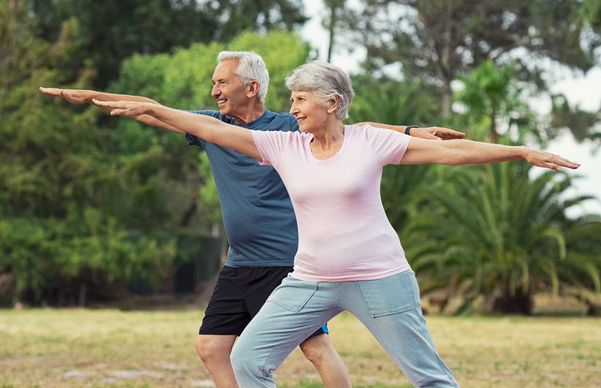 Senior couple practicing yoga