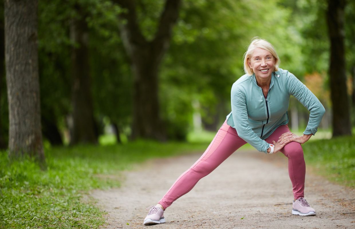 Woman performing leg stretches